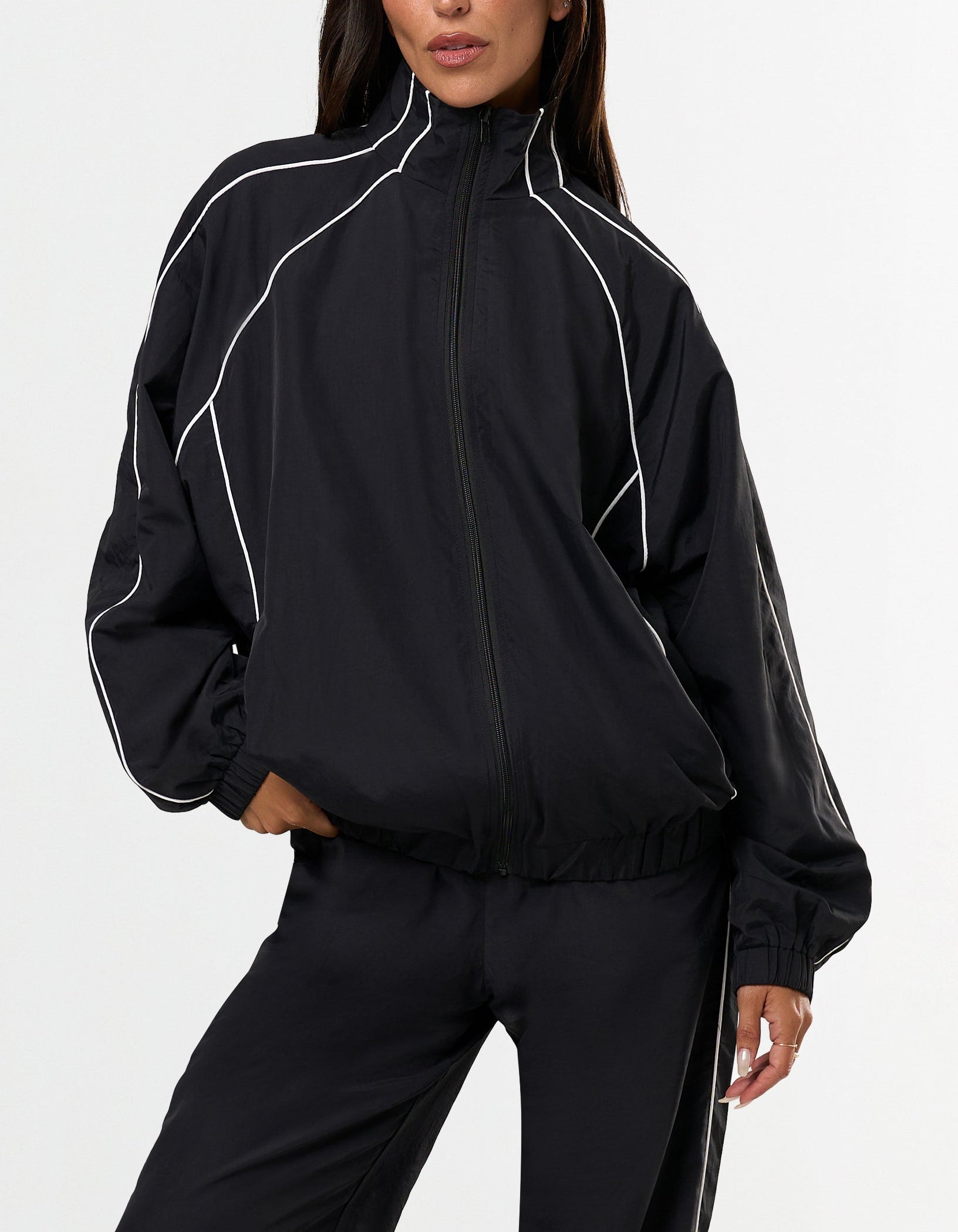 STAX. Woven Track Jacket in Black - Nylon Material - Activewear for elevated everyday wear 