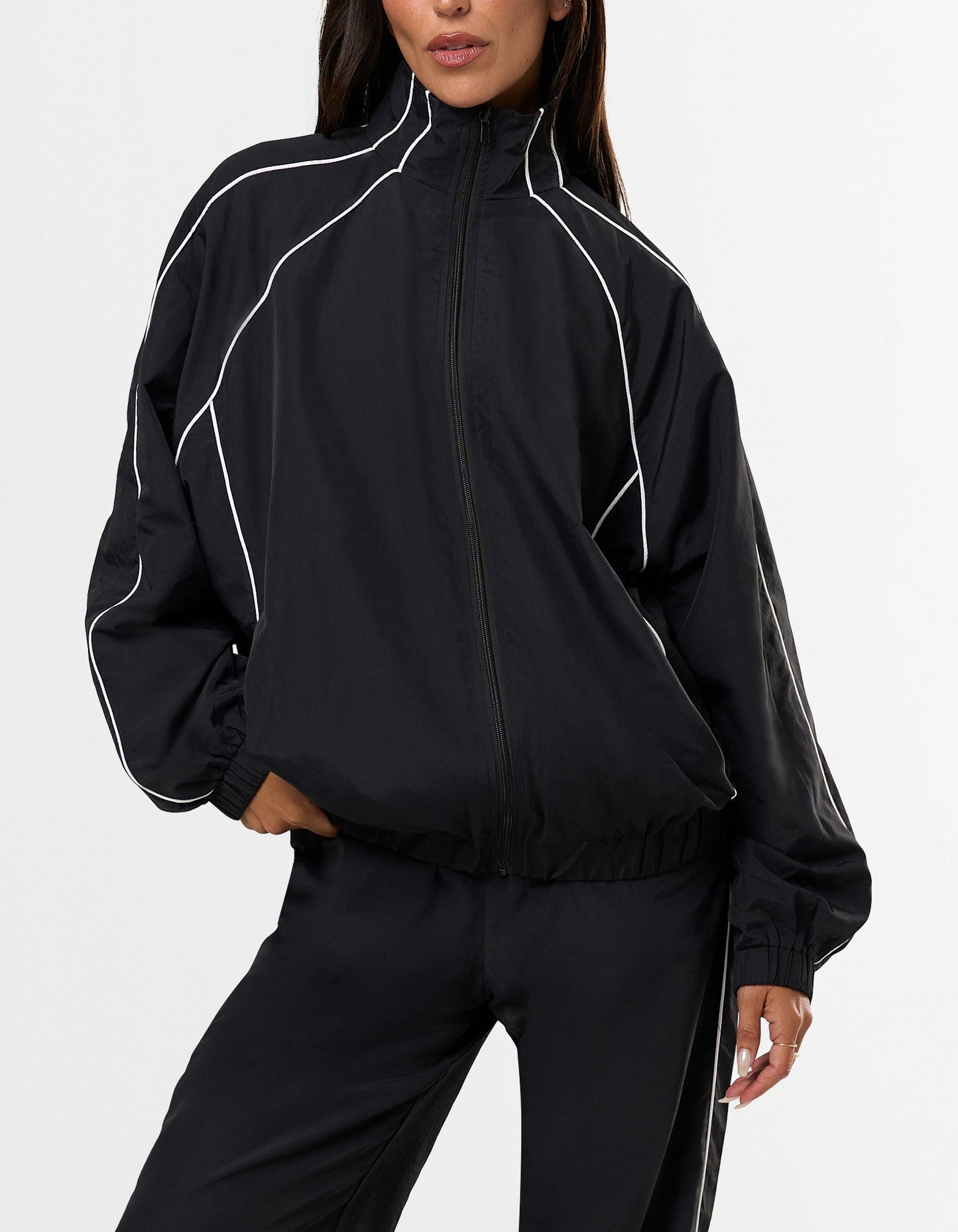 STAX. Woven Track Jacket in Black - Nylon Material - Activewear for elevated everyday wear 