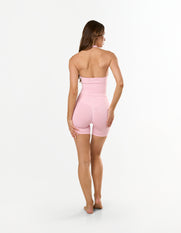 Back view of STAX. V Premium Seamless Skulpt Halter Tank in Pink showing halter neck design and compressive fit