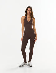 Front view of STAX. Premium Seamless Skulpt Halter Tank in Brown with compressive curve sculpting fabric