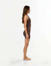 Side profile of STAX. Premium Seamless Skulpt Halter Tank in Brown with compressive fit