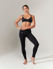 Front view of model wearing STAX. Premium Seamless Tights in Astro with matching premium seamless bralette 