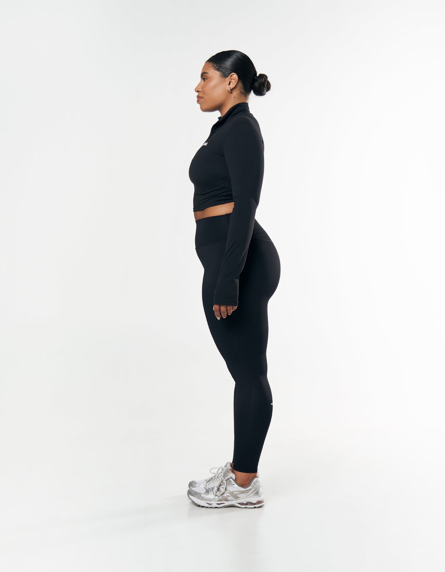 Side profile of STAX. Full Length Tights NANDEX ™ Original in Black showing flattering fit