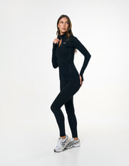 Side profile of STAX. Zip Jacket NANDEX™ in Black showing waist support to accentuate your shape  