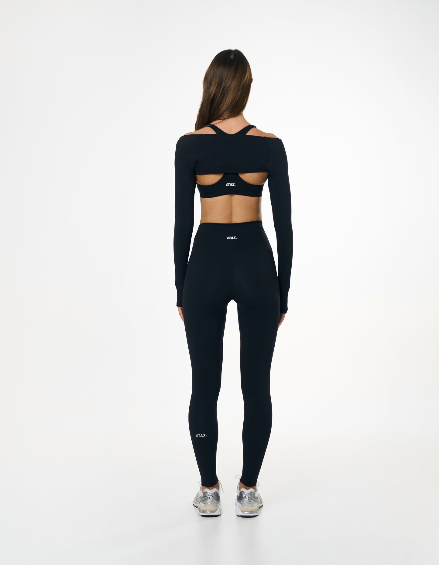 Back view of STAX. Full Length Tights NANDEX™ Original in black showing flattering design and white logo 