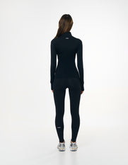 Back view of STAX. Zip Jacket NANDEX™ in Black showing flattering design and fit
